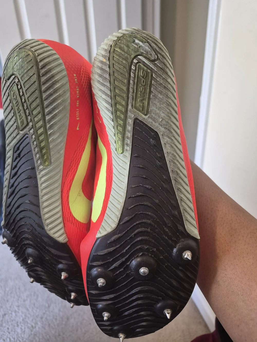 Nike Men's Red Track Cleats with Neon Green Swoosh
